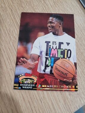 Topps Dominique Wilkins Card — White Tee with Multicolor Text